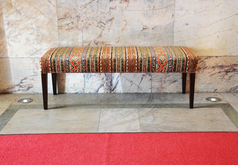 Hotel Diplomat Стокхолм Екстериор снимка A bench in the lobby of the National Museum of the United States Army
